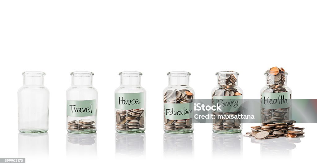 Glass jars with coins, savings concept Jar Stock Photo