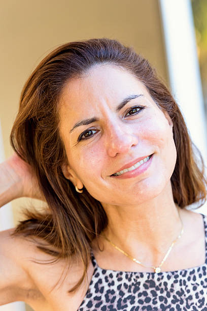 istock Mature hispanic woman smiling 599904256