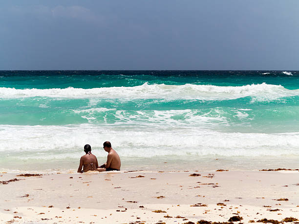 Heringsdorf, Germany, May 9, 2022 - An unidentified elderly couple walking on beautiful sandy beach
