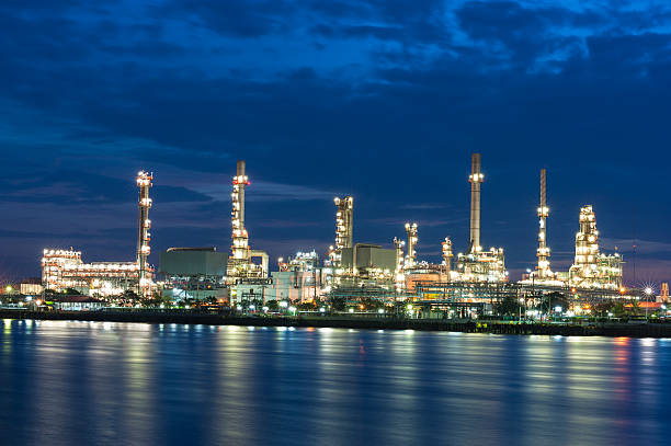 istock Oil refinery at night 599905410