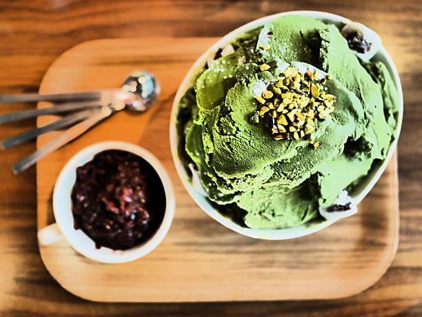 red bean and green tea Sherbet yummy!red bean and green tea ice cream!Especially in the summer is one of the most popular food in Korea. Green tea ice cream, green tea ice cream and jam and sweet red beans boiled with sugar with food together. In Korea, called "red bean sherbet". With nuts and milk, condensed milk.According to symbol, mango, mango, strawberries and other eat with fruit syrup together. Price is more than 7,000 to 15,000 won in Korean money, is at all. red bean dessert stock pictures, royalty-free photos & images