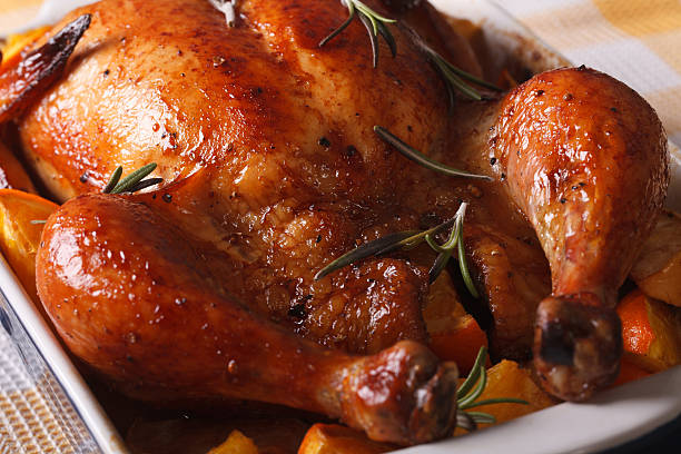 istock baked chicken with oranges in the baking dish macro. horizontal 599905860