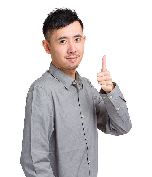 istock Chinese man giving thumbs up 599907946