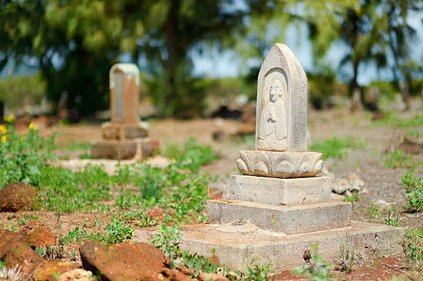 Very old chinese grave headstones abandoned near Glass Beach in Kauai