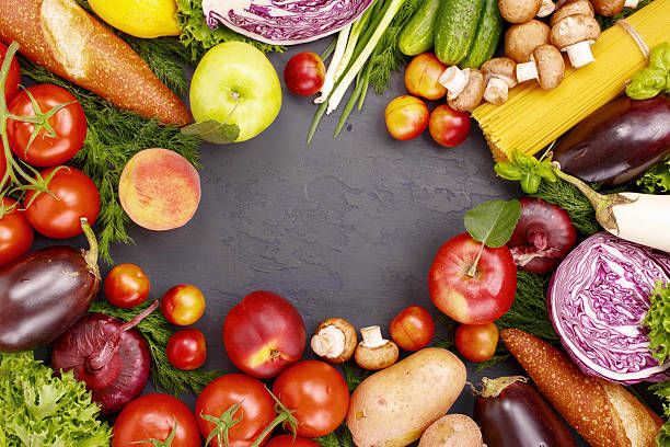 istock Frame of different food products on a dark surface 599910408