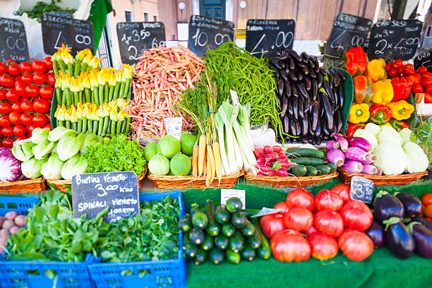 istock Market stall with fresh vegetables in Italy 599911690