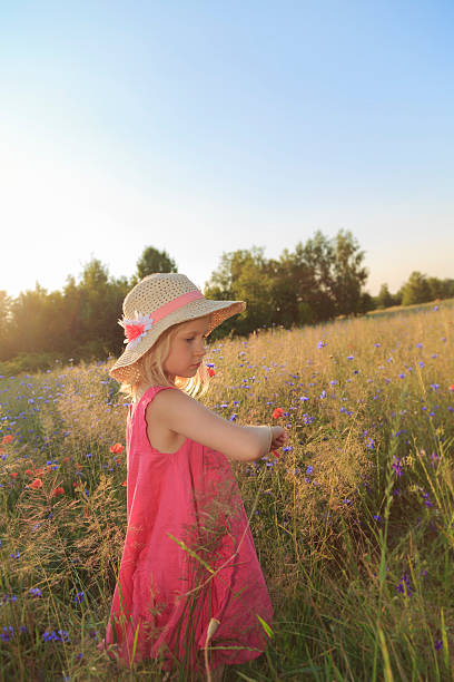 istock Girl in meadow 599912034