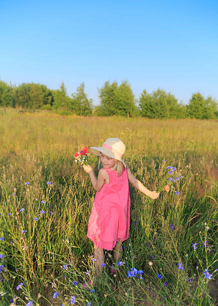 istock Girl in meadow. 599912130