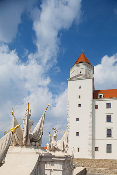 Bratislava, Slovakia - August 15, 2016: View of the Castle of Bratislava, a massive rectangular building housing a museum and the presentation rooms for the National Council of the Slovak Republic. 
