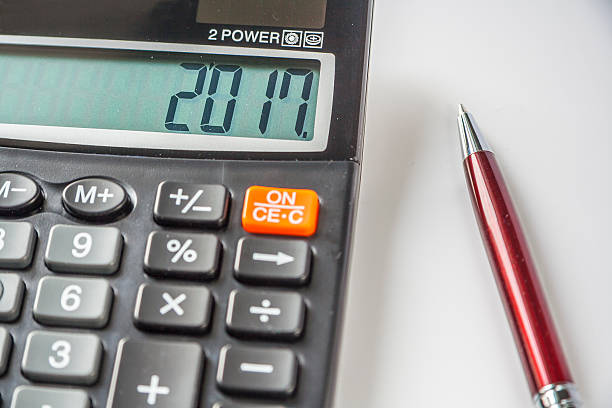 istock The 2017 Year on The Calculator And Pen 599914948