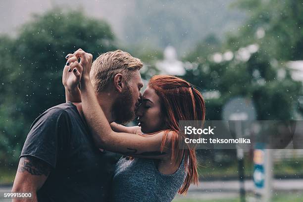 Beautiful Couple Kissing In The Rain Stock Photo - Download Image Now - Rain, Kissing, Couple - Relationship - iStock Beautiful Couple Kissing In The Rain Stock Photo - Download Image Now - Rain, Kissing, Couple - Relationship - iStock