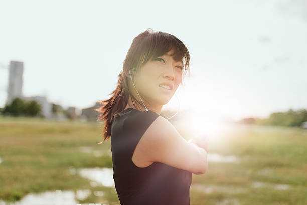istock Female runner taking break from training in morning 599920832