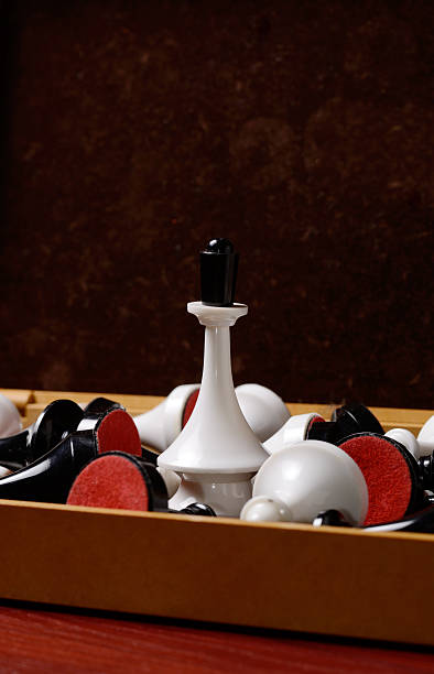 istock Black and white chess in the box,  Queen standing in 599923622