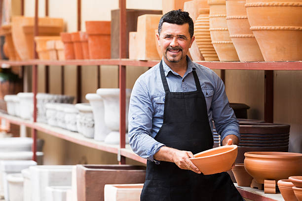 istock Craftsman with ceramic crockery 599923826