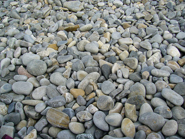 istock Texture of pebbles from a beach shore 599950678
