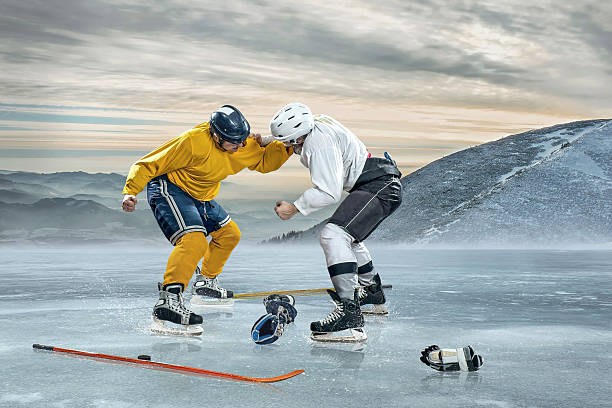 istock Ice hockey player on the ice in mountains 599950792