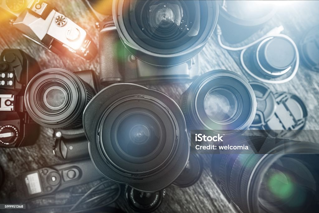 Photography Is My Passion Photography Is My Passion. Professional Photography Equipment on the Table. Lenses, Cameras and Other Equipment For a Pro Photo Shooting. Brown Stock Photo
