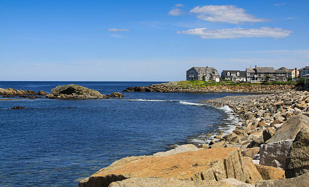 istock Harbor View, Rocks and Waterfront Houses, Perkins Cove, Ogunquit, Maine. 599951516