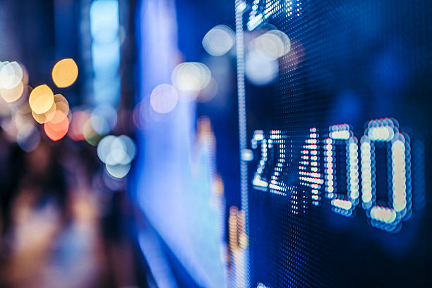 istock display stock market numbers and graph 599954316