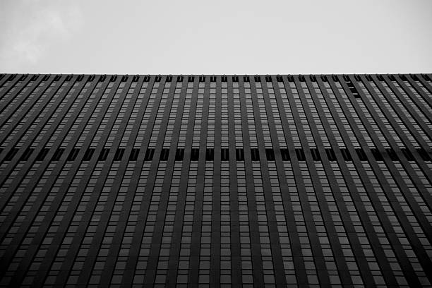 istock Bottom view of a Building during cloudy day 599955838