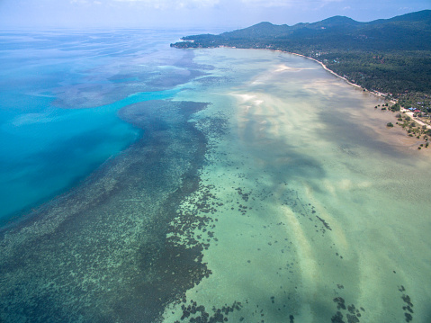 aerial view of the beach from the shallow water, Koh Phangan, Thailand