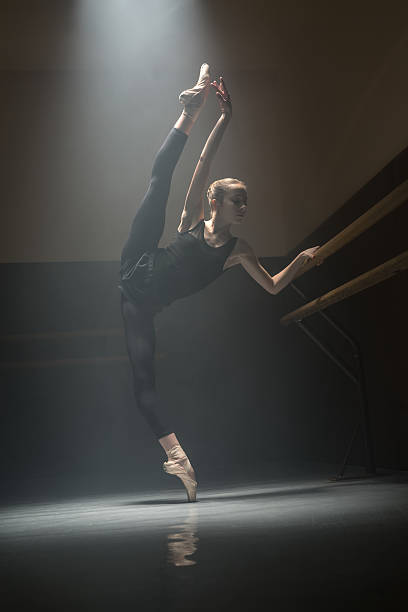 istock Single ballerina in the class room 599957614