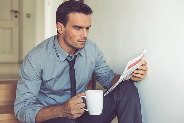istock Handsome businessman at home 599958114