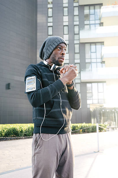 istock Young Athletic Man Warming Up And Concentrating Before Exercising 599958162