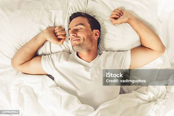 Man In The Morning Stock Photo - Download Image Now - Men, Sleeping, Bed - Furniture