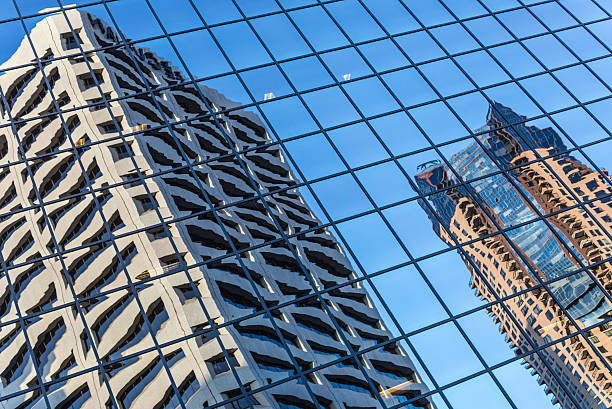 istock Reflection of Skyscraper Buildings in Glass Windows 599962150