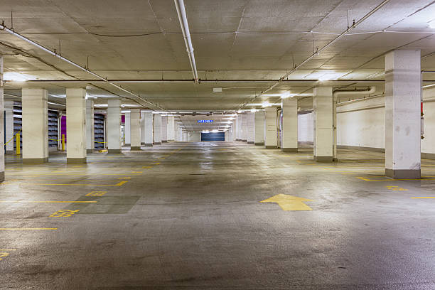 istock Entrance to a grungy empty parking area 599962210