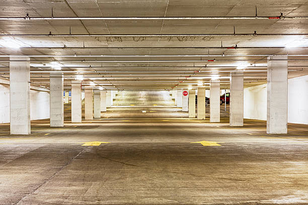 istock View down the length of an empty parking garage 599962234