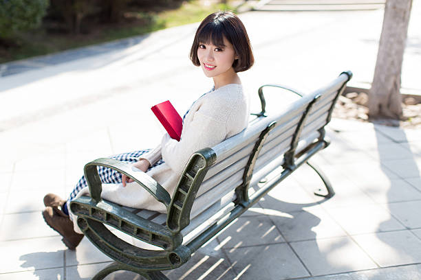 istock outdoors, beautiful asian girl 599962356
