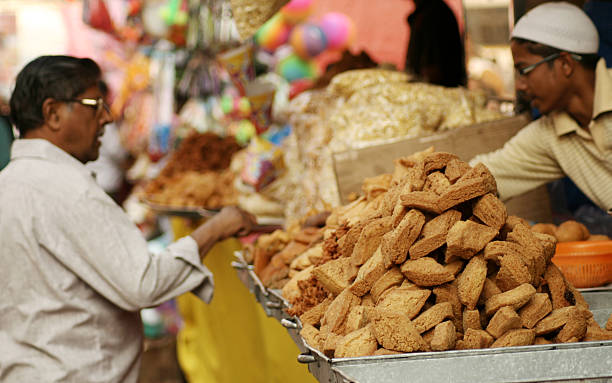 Street Food Vendor sell Fast food in busy Road stock photo