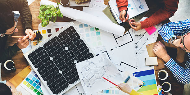 istock Business People Discussion Solar Power Energy Concept 599965162