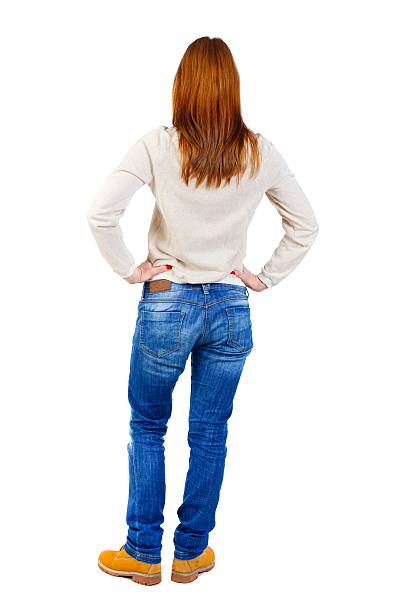 istock back view of standing young beautiful  woman 599968092