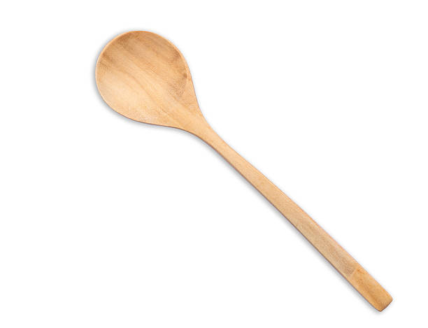 istock Top view bright wooden spoon isolated on white 599970354