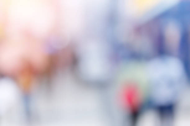 istock People walking down the street in the evening 599972570