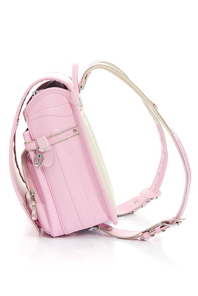 istock school bag on white background isolated 599974396