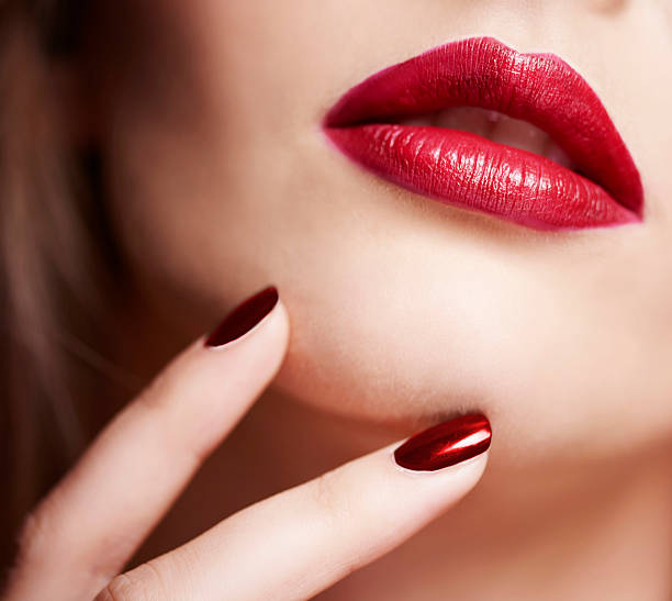 istock Close up on red female face 599975138