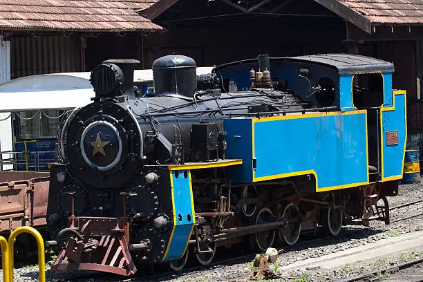 Nilgiri mountain railway. Blue train. Unesco world heritage. Narrow-gauge. Steam locomotive in depot