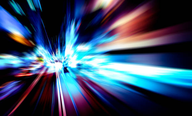 istock moving traffic light trails at night 599975910