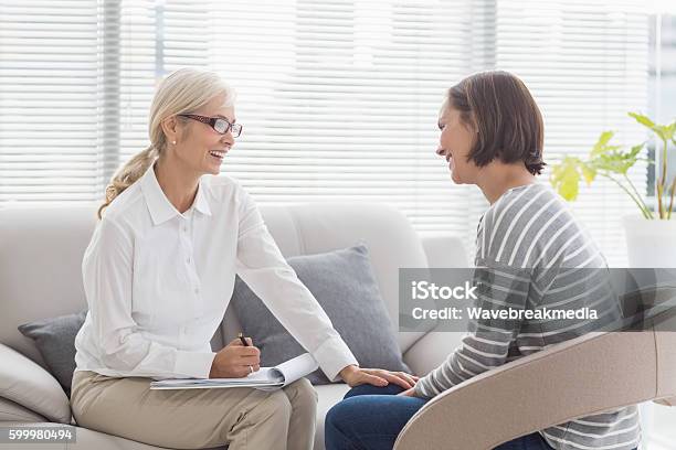Happy Therapist With Patient Stock Photo - Download Image Now - Mental Health Professional, Mental Health, Psychotherapy