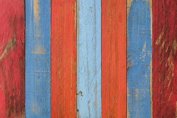 istock Old red and blue wooden board background. 599981068