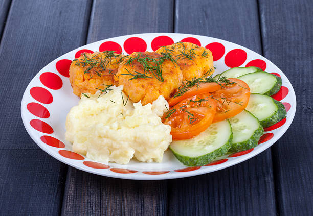 istock vegetarian food. carrot cutlets with mashed potatoes and vegetables close 599982440