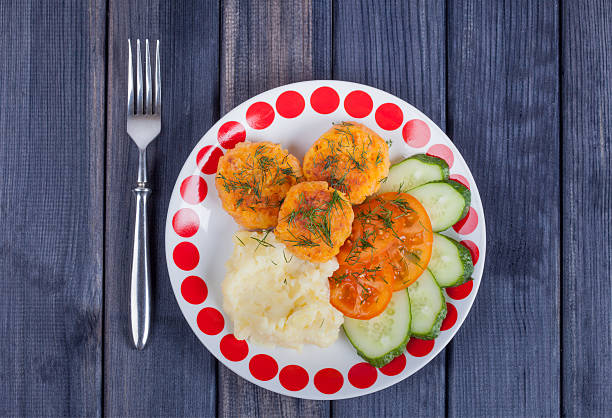 istock vegetarian food. carrot cutlets with mashed potatoes on the table 599983184