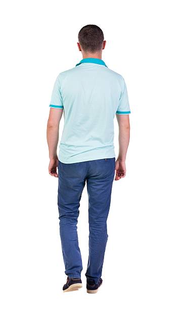 istock Back view of going  handsome man in jeans and a 599983688
