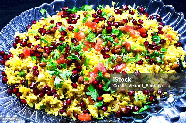 Poha A Popular Indian Dish Served In A Tray Stock Photo - Download Image Now - Pomegranate, Rice - Food Staple, Tray