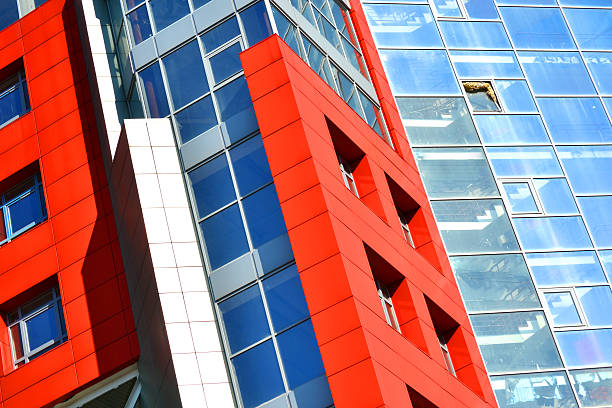 istock Red wall facade of a modern building 599990316