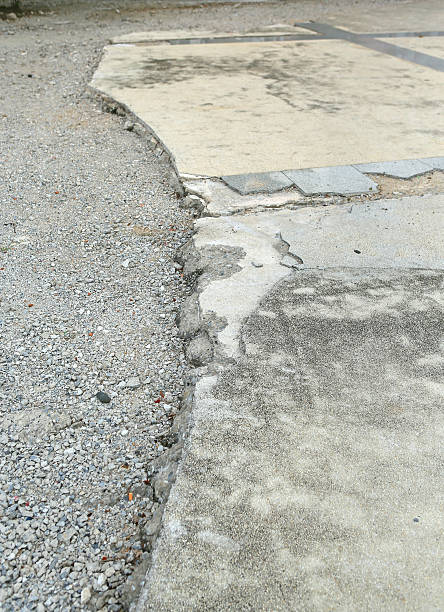 istock Cracked surface of an asphalt road 599992460